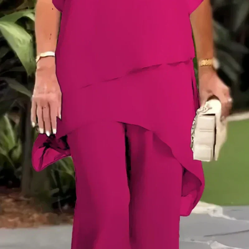 Almudena - Conjunto top de corte irregular y pantalones de pierna ancha.